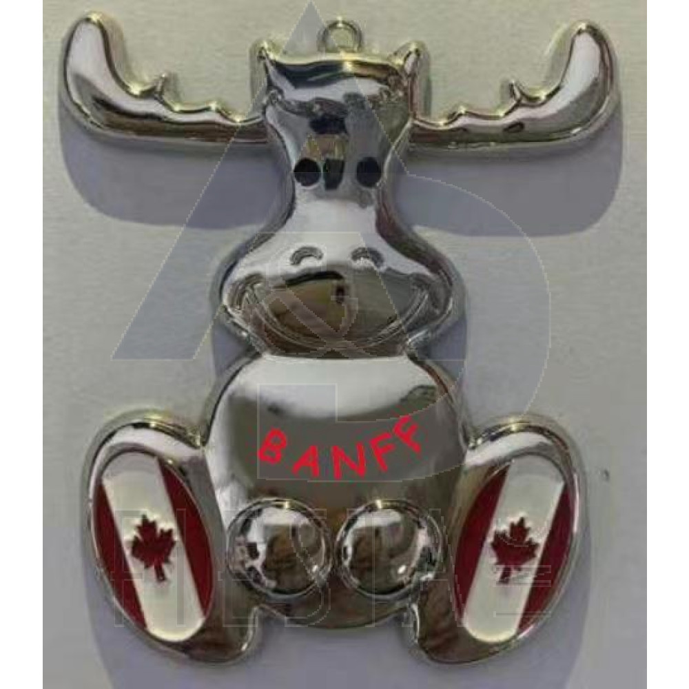 BANFF METAL SITTING MOOSE WITH FLAGS MAGNET