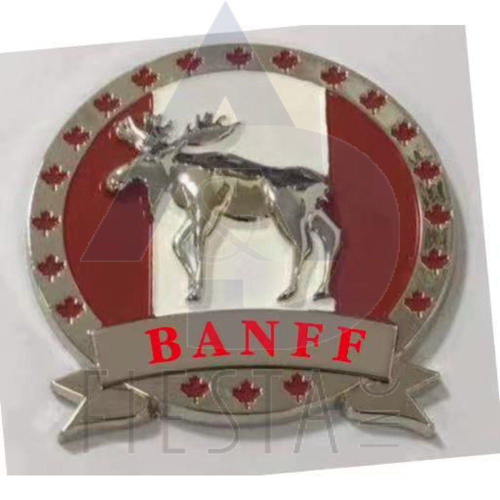 BANFF METAL ROUND MOOSE MAGNET WITH MAPLE LEAFS BORDER AND RIBBON MAGNET